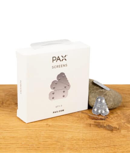 PAX Ersatzsiebe (3er Pack) in der Originalverpackung auf einem Holztisch, mit zwei losen Sieben im Vordergrund.